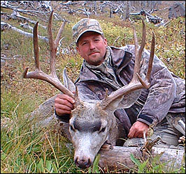 Hunter with his 5x5 mule deer buck scoring 152 B&C. Taken in Absaroka-Beartooth Wilderness.